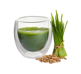 Glass of fresh wheat grass juice, seeds and sprouts on white background