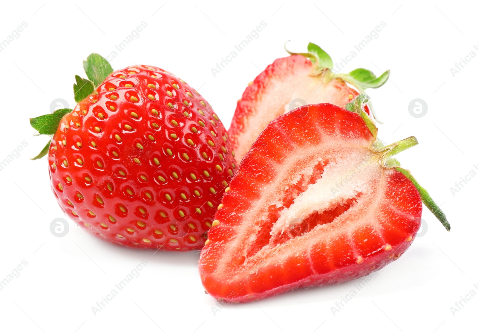 Photo of Delicious whole and cut strawberries on white background