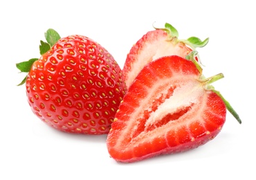 Photo of Delicious whole and cut strawberries on white background