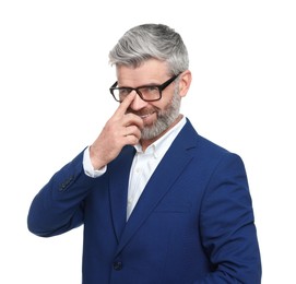 Mature businessman in stylish clothes posing on white background