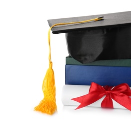 Photo of Graduation hat with books and diploma isolated on white