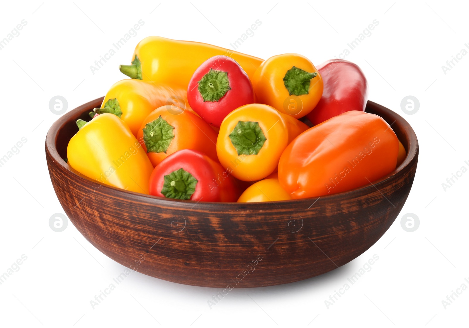 Photo of Bowl of ripe bell peppers isolated on white