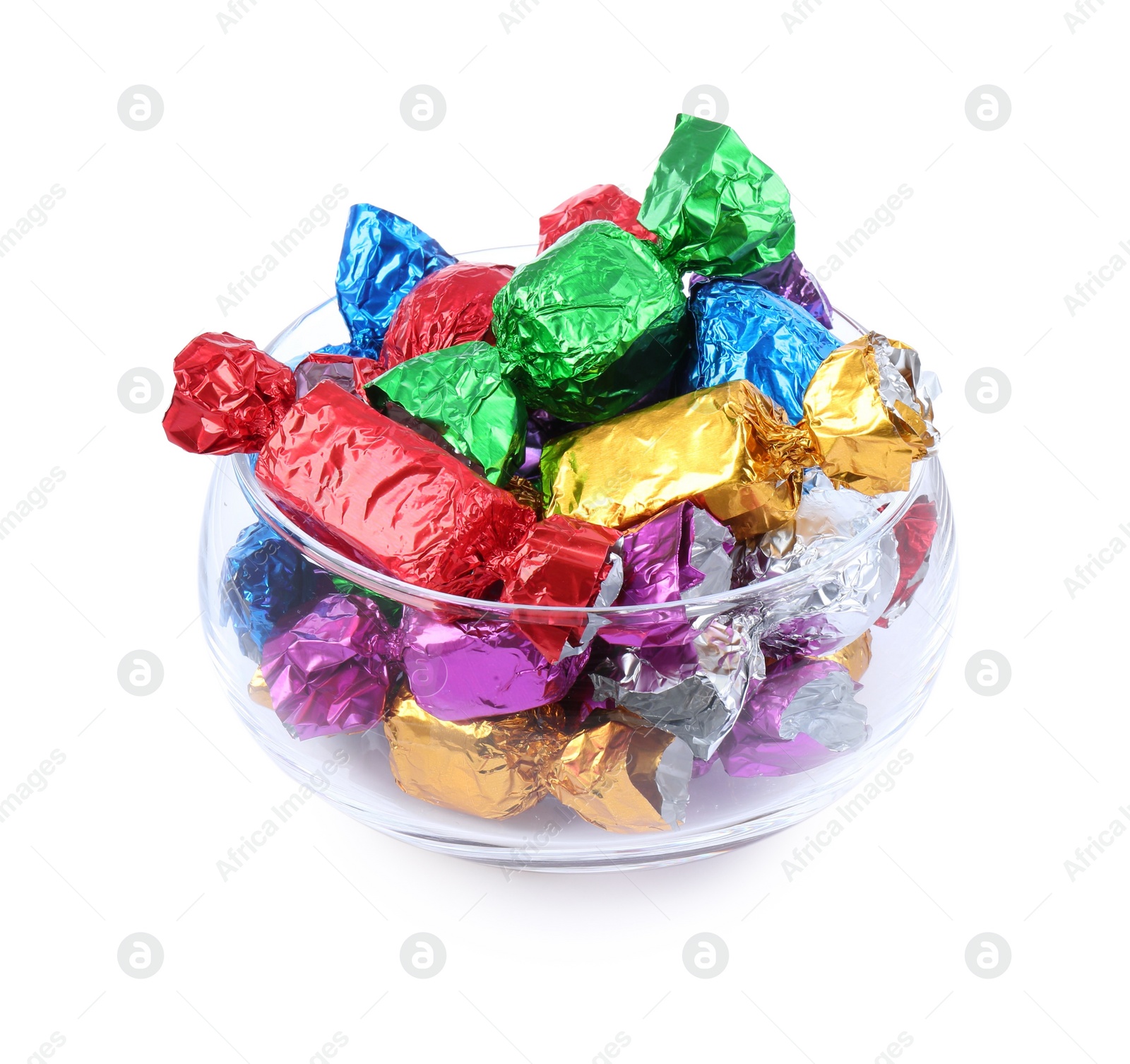 Photo of Bowl with many tasty candies in colorful wrappers on white background