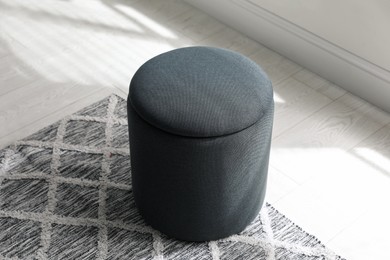 Stylish comfortable ottoman in room. Home design