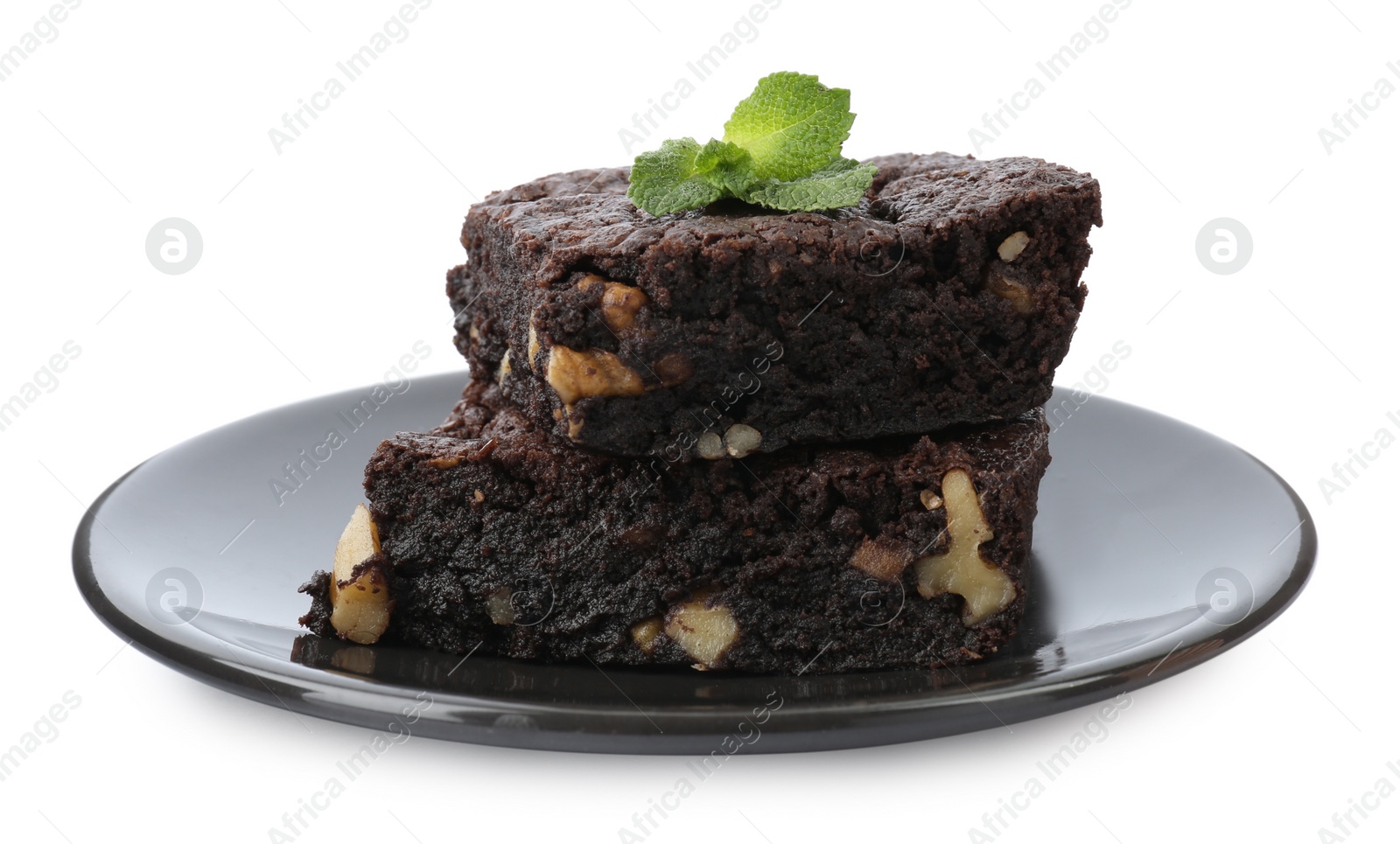 Photo of Delicious brownies with nuts and mint on white background