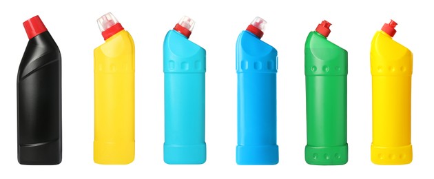 Set with bottles of different cleaning products on white background, banner design. Household chemicals