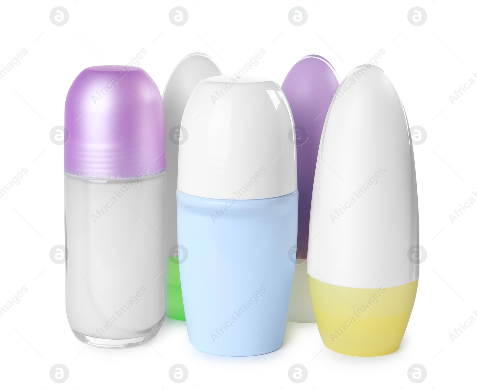 Photo of Different female roll-on deodorants on white background. Skin care