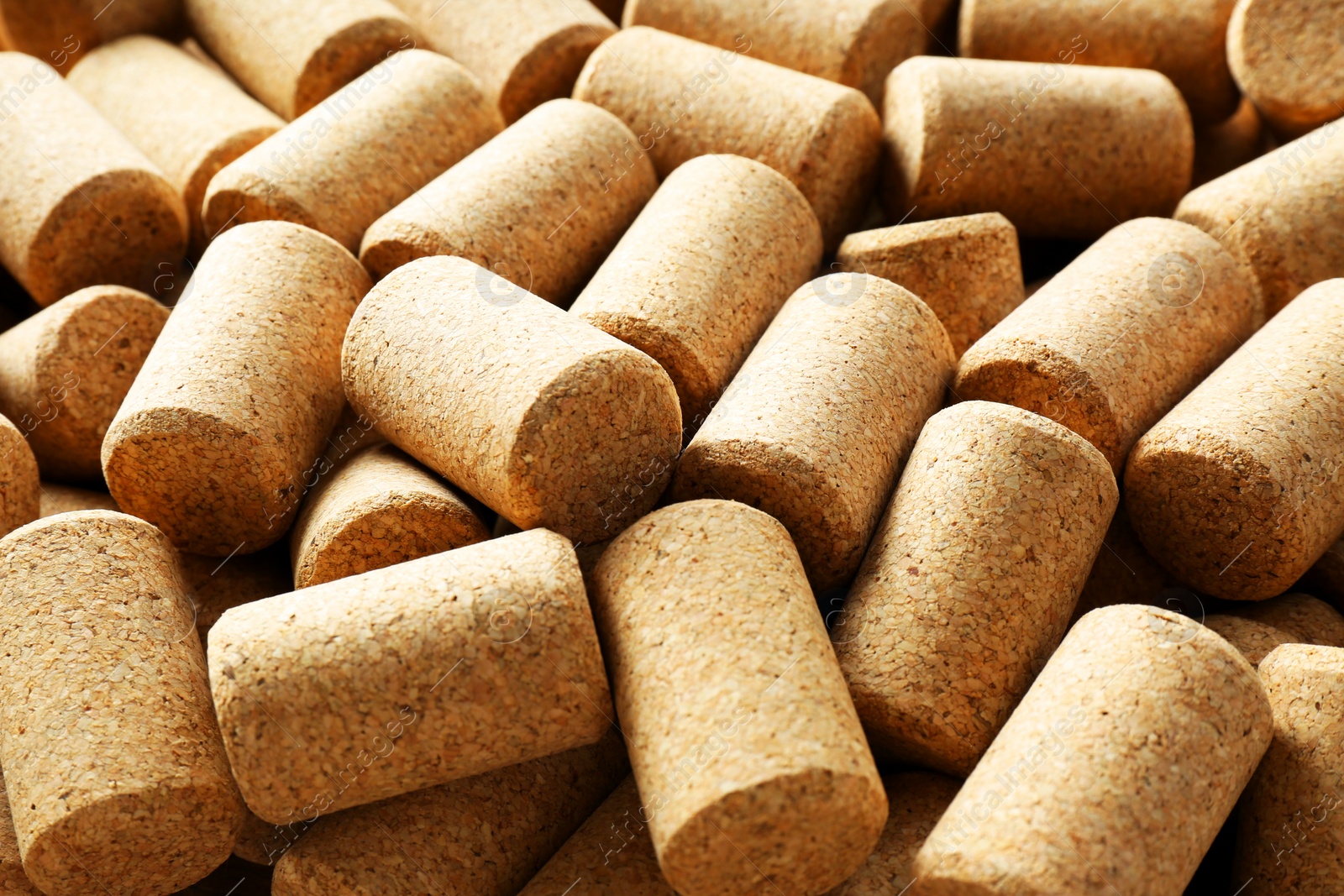 Photo of Many corks of wine bottles as background, closeup