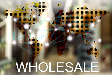 Image of Wholesale business. World map and blurred view of warehouse on background