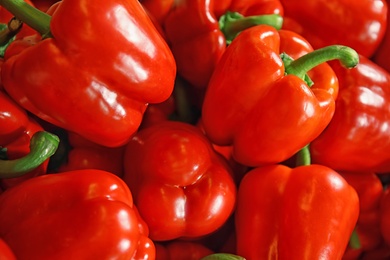 Pile of paprika peppers as background, closeup