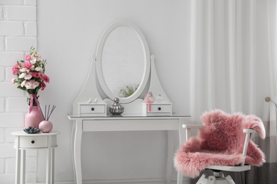 Photo of Stylish room interior with white dressing table