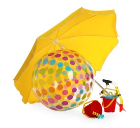 Beach umbrella, inflatable ball and child's sand toys on white background