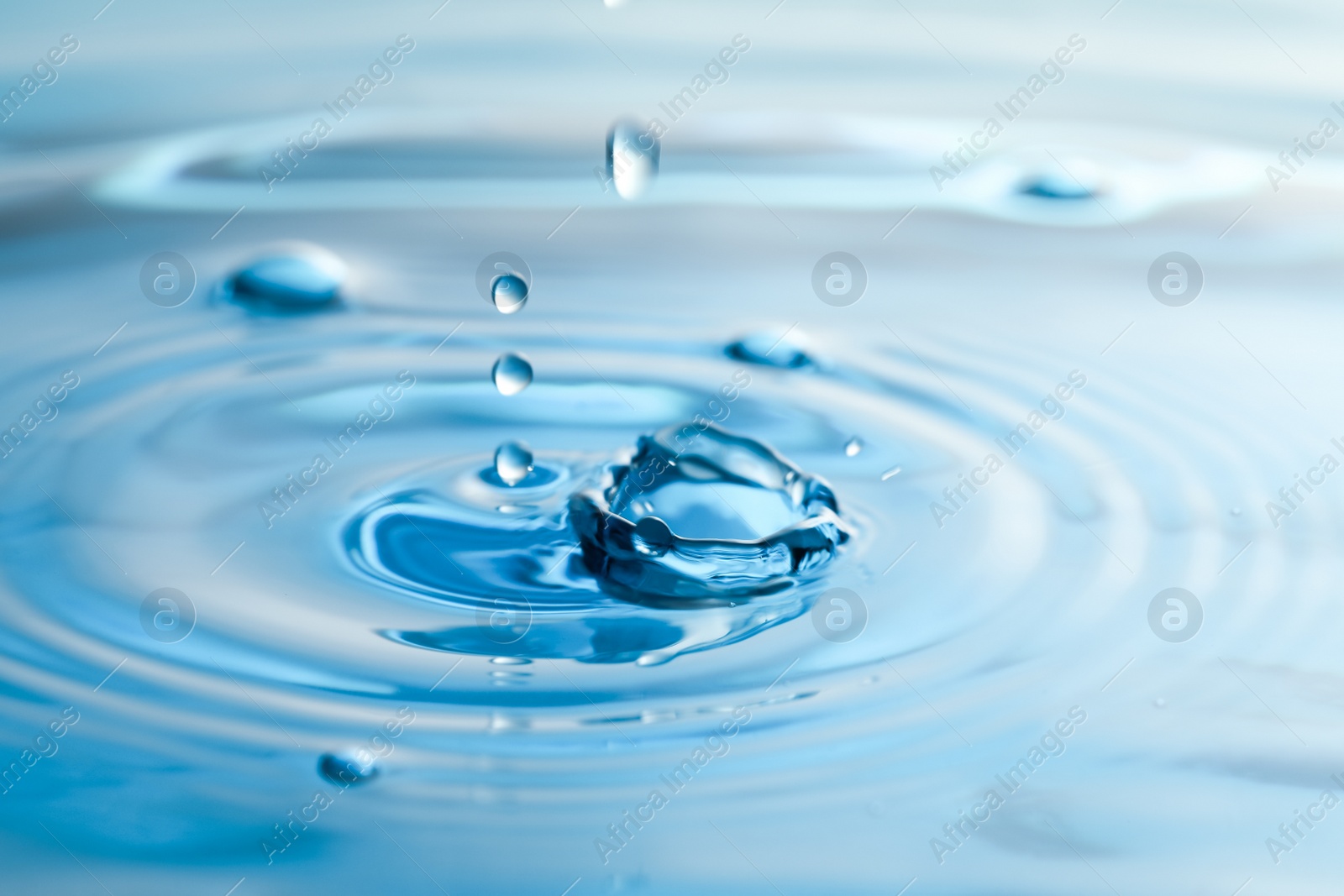 Photo of Splash of clear water with drops as background, closeup