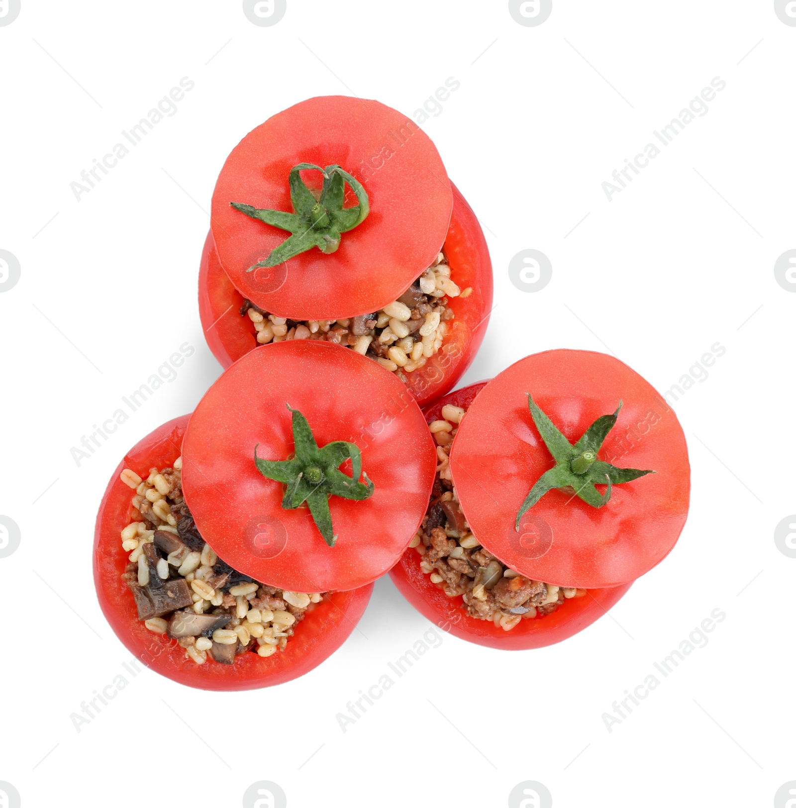 Photo of Delicious stuffed tomatoes with minced beef, bulgur and mushrooms isolated on white, top view