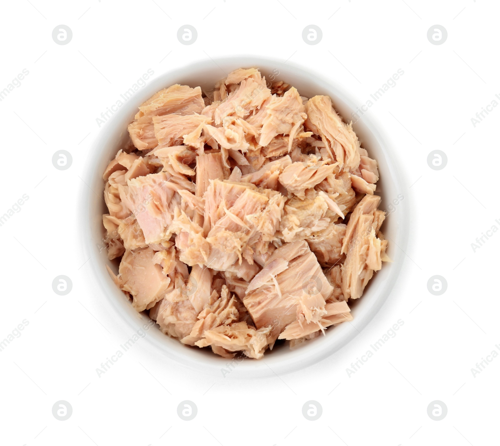 Photo of Bowl with canned tuna on white background, top view