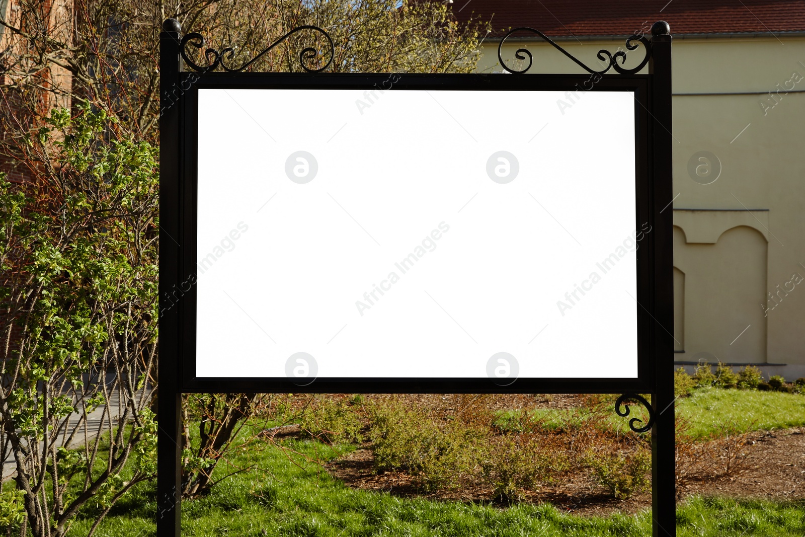 Image of Empty signboard outdoors on sunny day. Mock-up for design