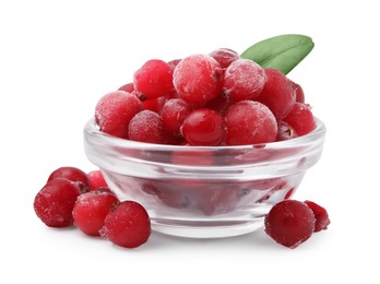 Photo of Frozen red cranberries in bowl and green leaf isolated on white