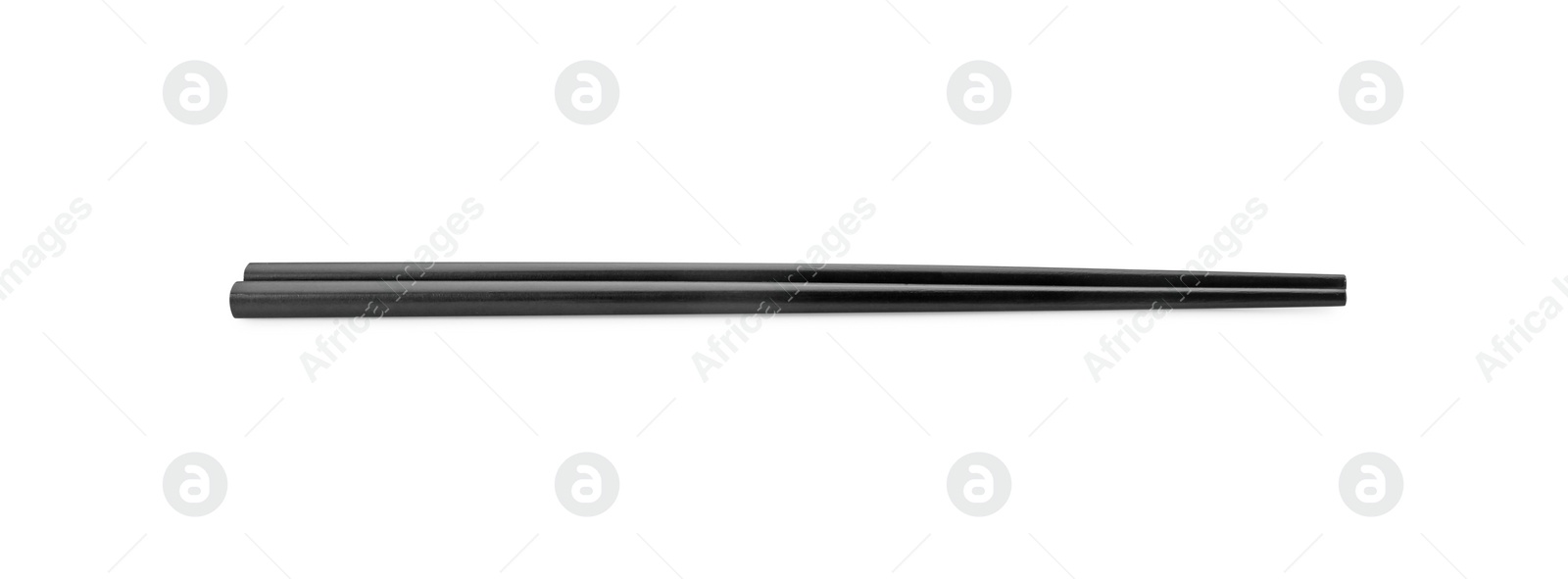 Photo of Pair of black chopsticks isolated on white