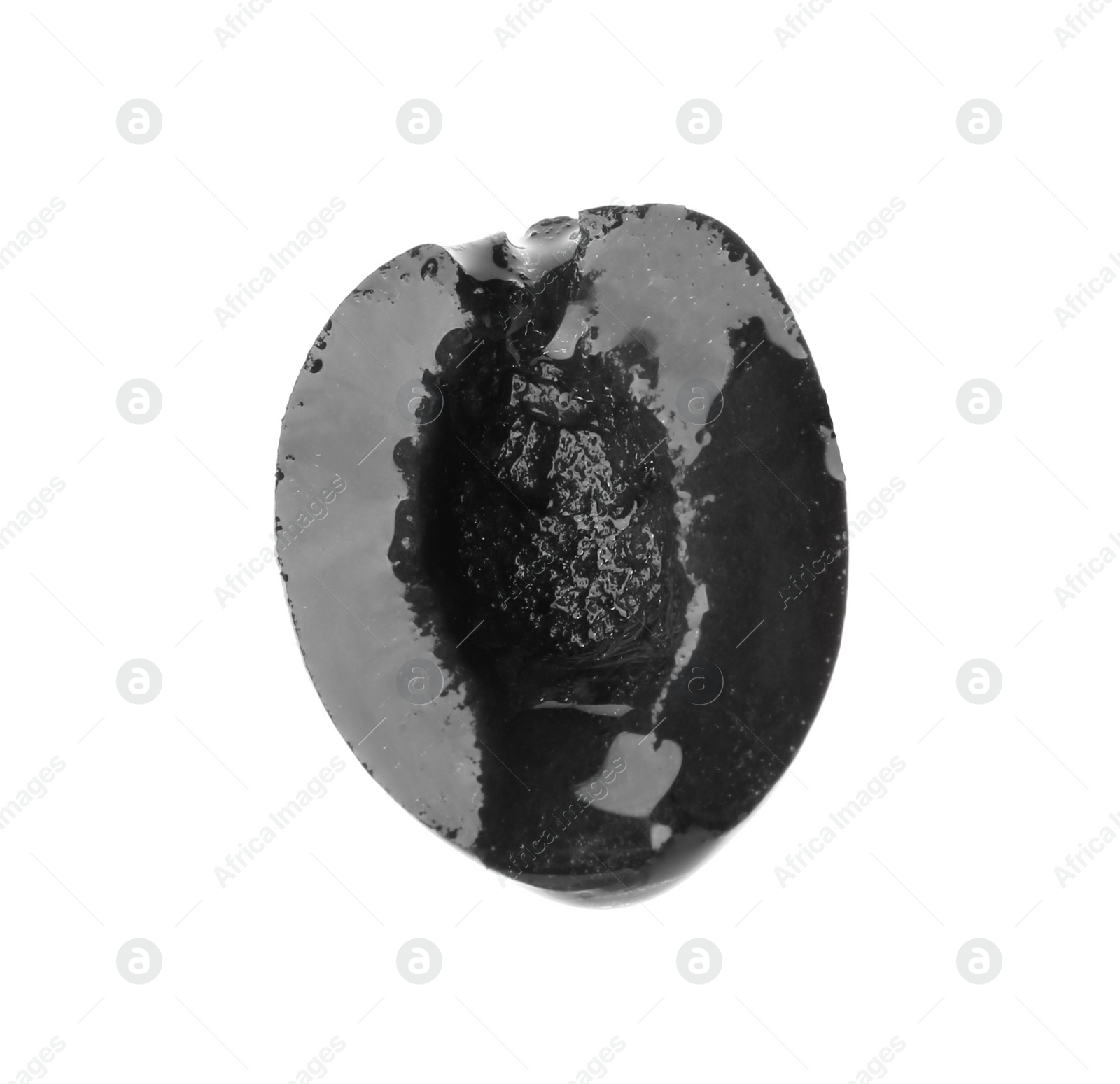 Photo of Slice of black olive on white background