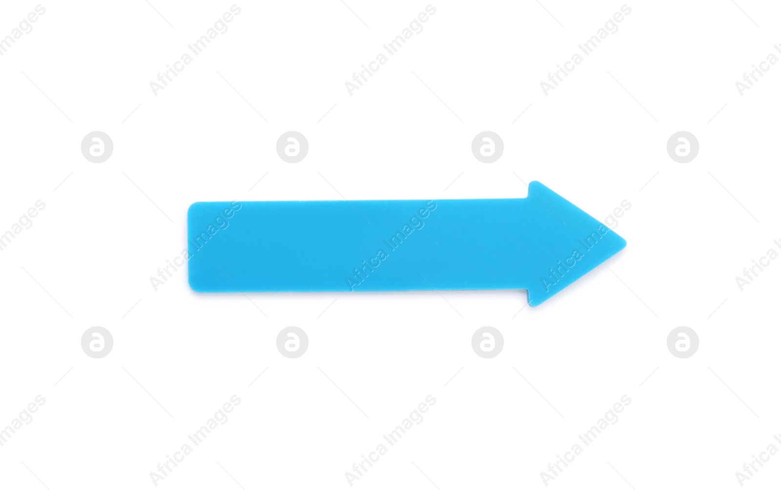 Photo of Colorful arrow shaped sticky note on white background. School stationery