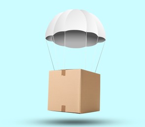 Cardboard box with parachute flying on light blue background