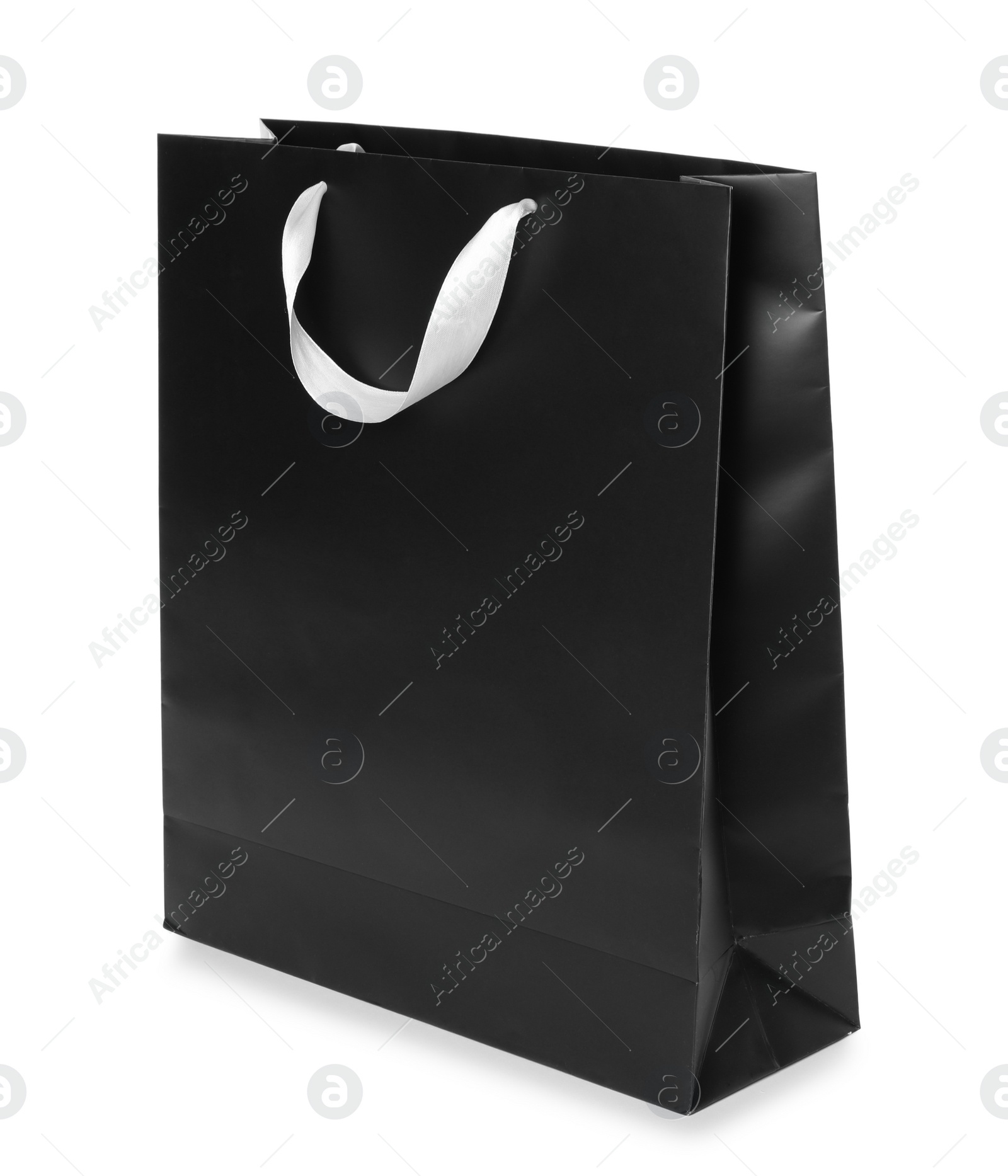 Photo of Paper shopping bag isolated on white. Mock up for design