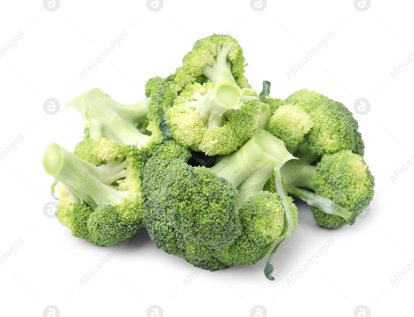 Photo of Pile of fresh raw green broccoli isolated on white