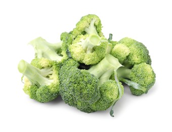 Photo of Pile of fresh raw green broccoli isolated on white