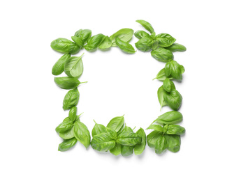 Photo of Frame made with basil leaves on white background, top view. Space for text