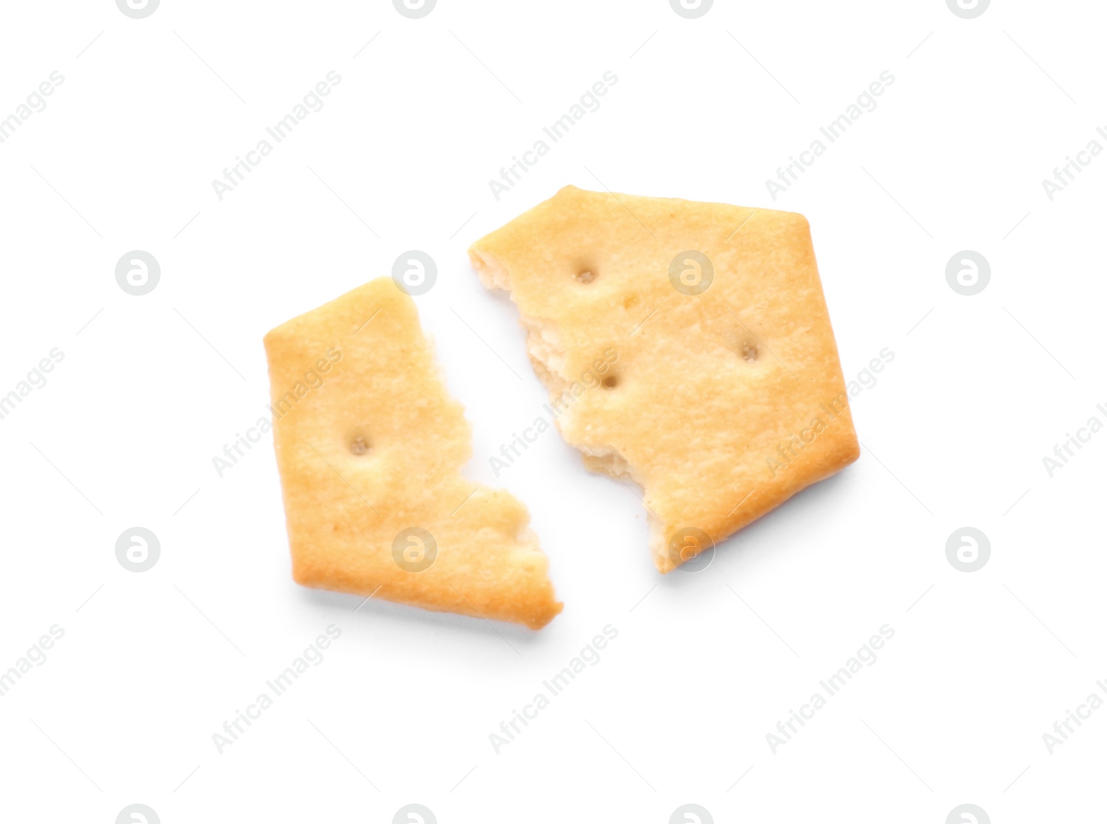 Photo of Broken delicious crispy cracker isolated on white