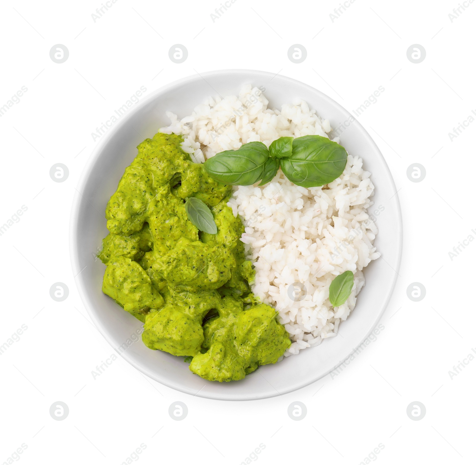 Photo of Delicious rice and chicken with curry sauce isolated on white, top view