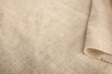 Texture of natural burlap fabric as background, closeup