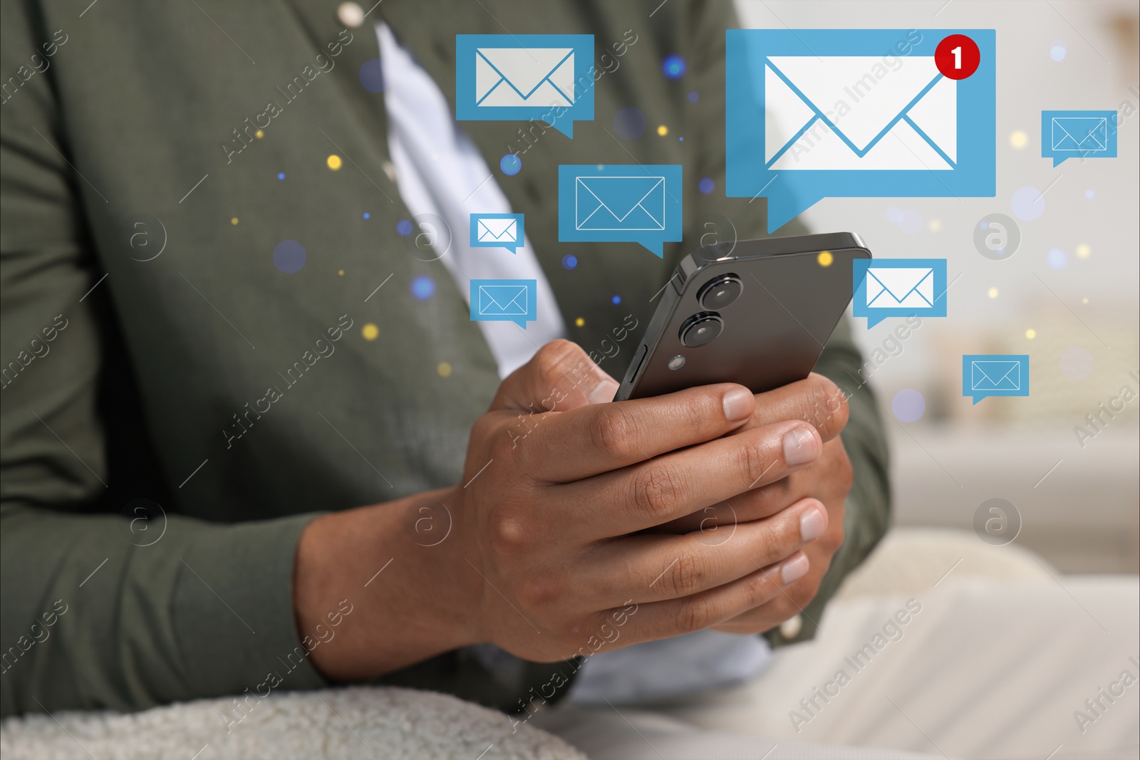 Image of Email. Man using mobile phone at home, closeup. Letter illustrations around device