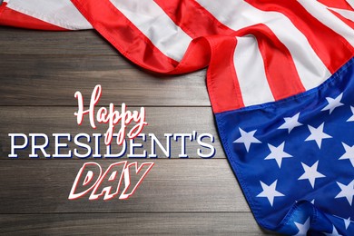 Happy President's Day - federal holiday. American flag and text on wooden background, top view