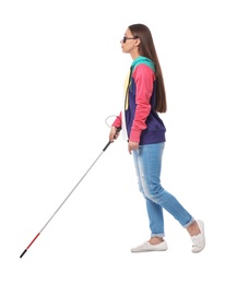 Photo of Young blind person with long cane walking on white background