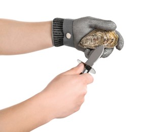 Man opening oyster with knife on white background, closeup