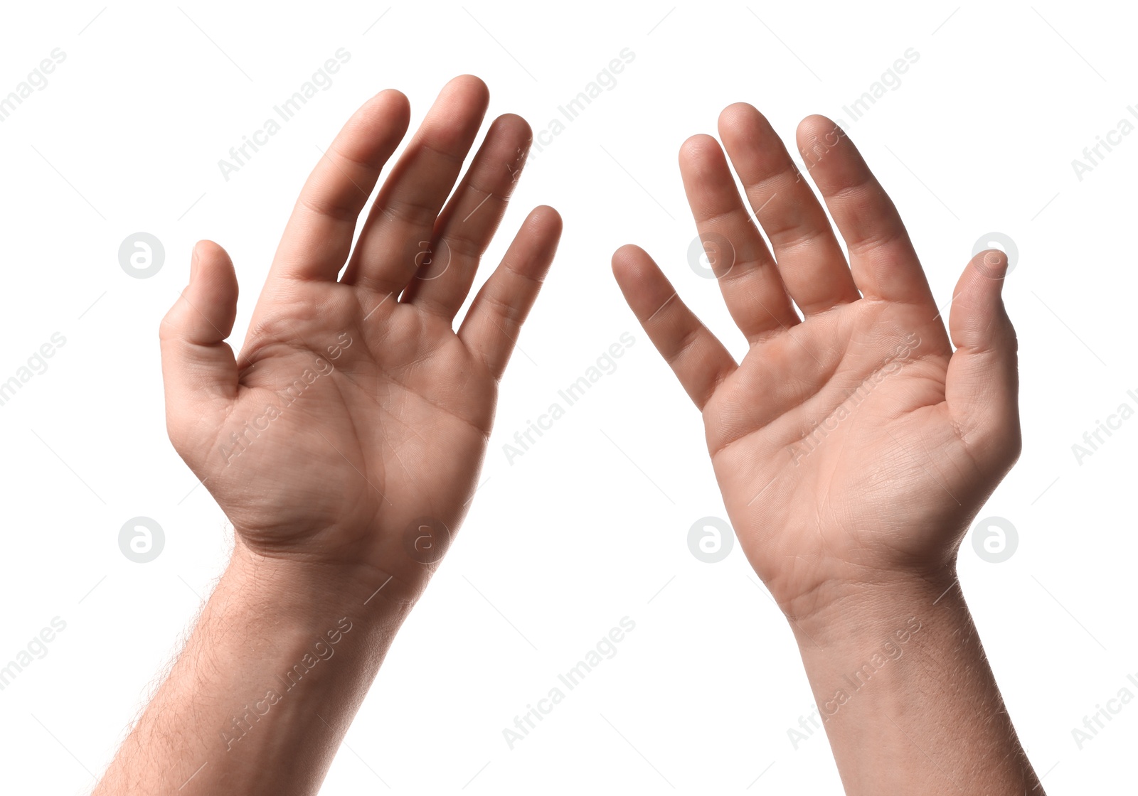 Photo of Religion. Man with open palms praying on white background, closeup