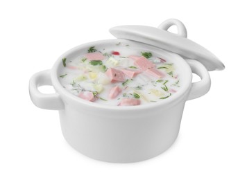 Photo of Delicious cold summer soup (okroshka) with boiled sausage in pot isolated on white