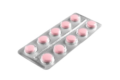 Photo of Blister of pink pills on white background