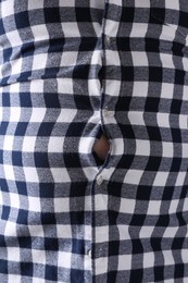 Man wearing tight shirt, closeup view. Overweight problem