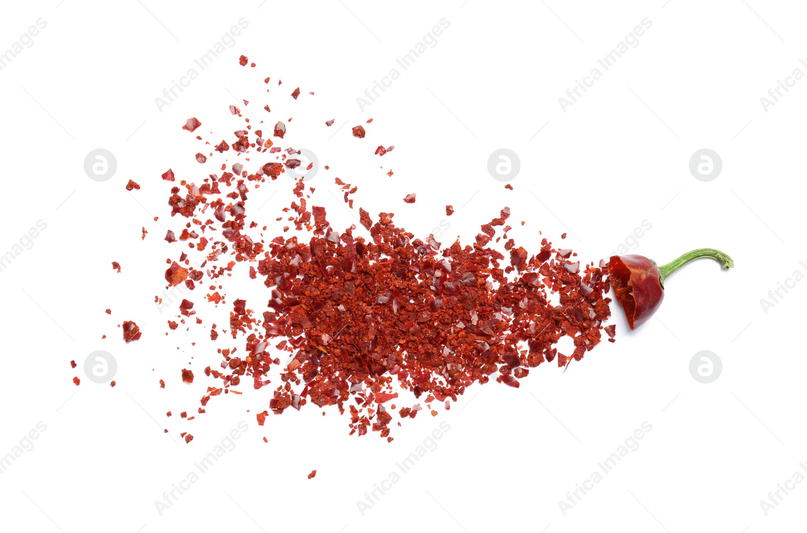 Photo of Crushed chili pepper on white background