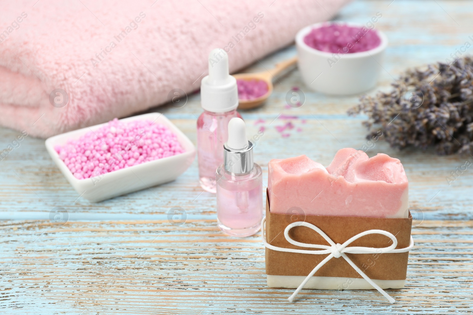 Photo of Natural handmade soap bar on wooden background