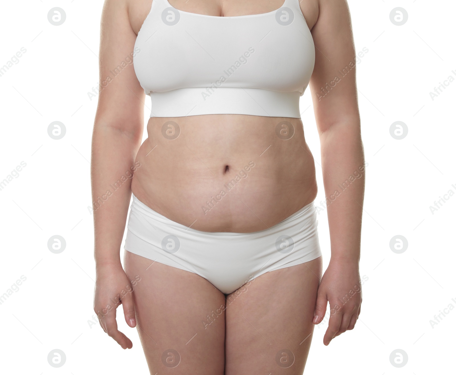 Photo of Woman with excessive belly fat on white background, closeup. Overweight problem