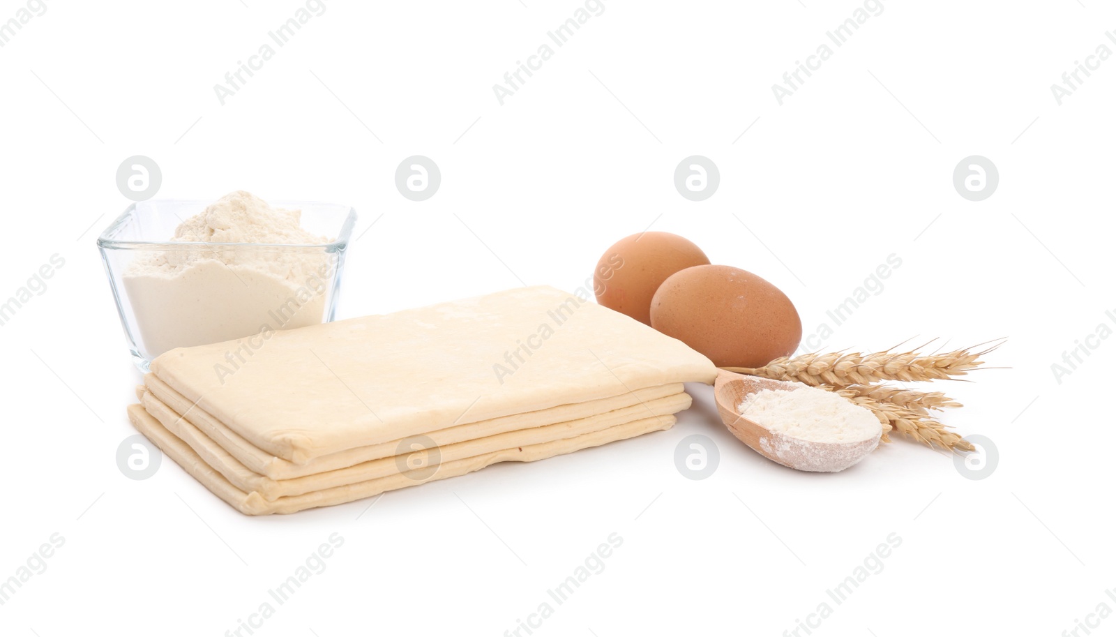 Photo of Composition with fresh dough on white background. Puff pastry