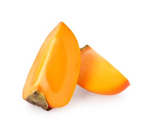 Photo of Pieces of delicious ripe juicy persimmons on white background