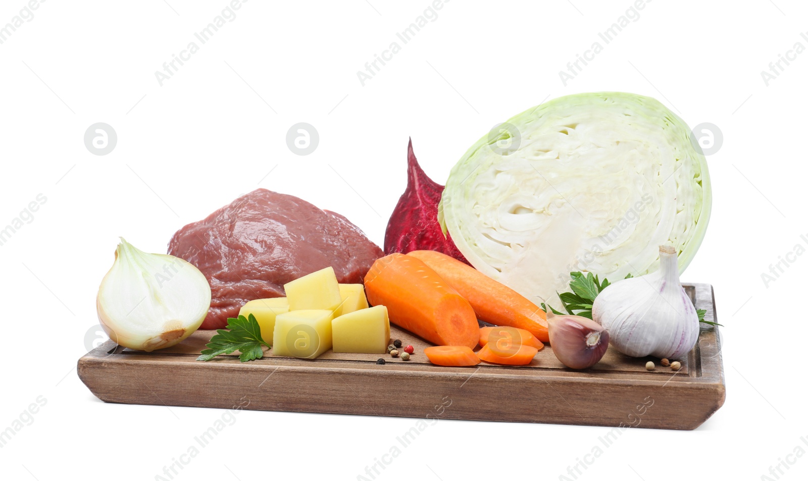 Photo of Ingredients for traditional borscht on white background