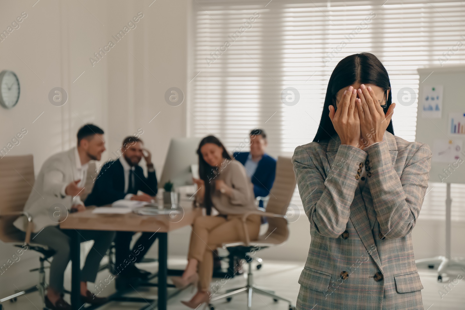 Photo of Woman suffering from toxic environment at work