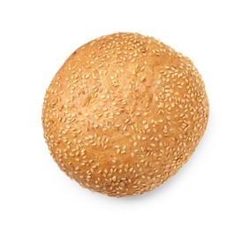 Photo of One fresh hamburger bun with sesame seeds isolated on white, top view