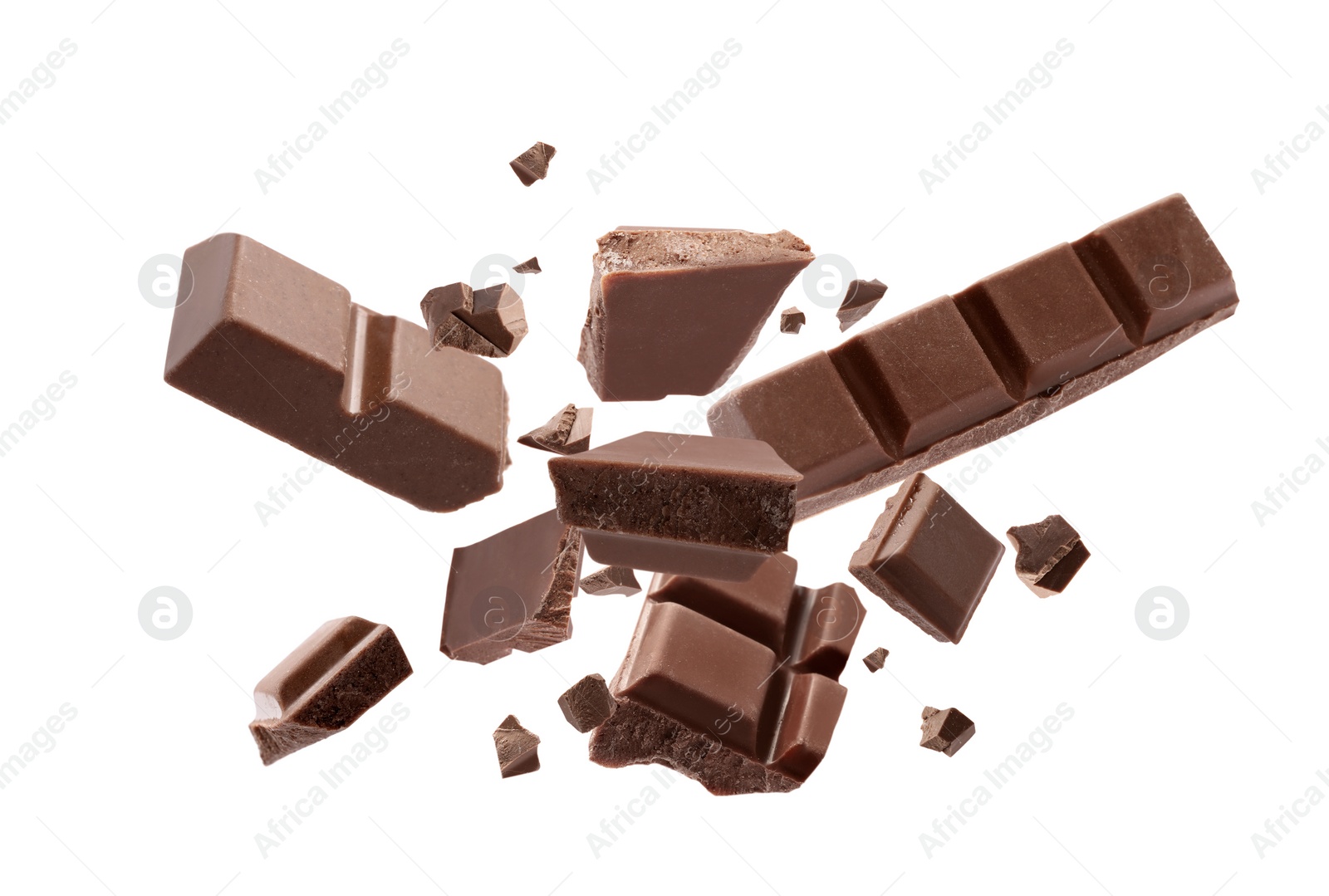 Image of Milk chocolate explosion, pieces shattering on white background