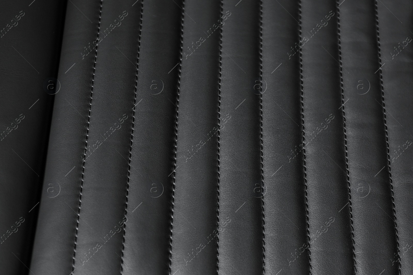 Photo of Car seat with leather upholstery, closeup view